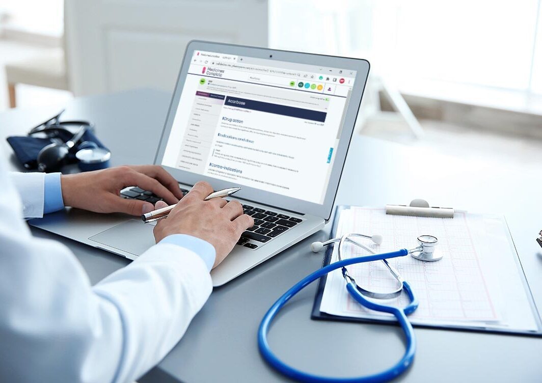Male doctor at work in clinic office